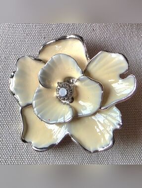 Vintage Hibiscus Flower Brooch In Ivory Trimmed In Silver With Rhinestone Center